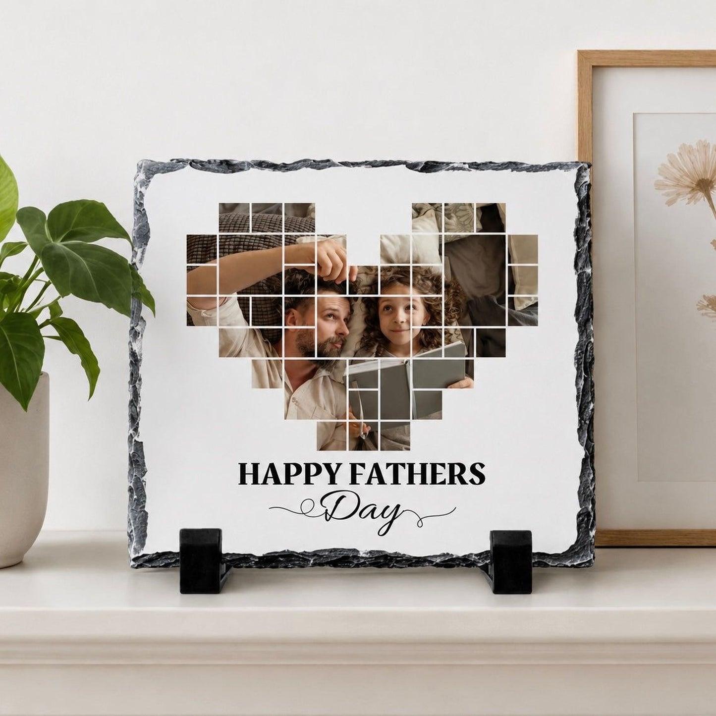 A heart-shaped photo frame with a collage of images inside, including a man and a child, and the text "Happy Fathers Day" on the frame.