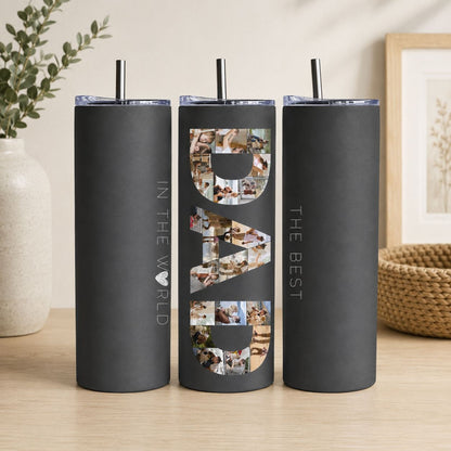 A black tumblers with the word "DAD" printed on them, along with a straw.