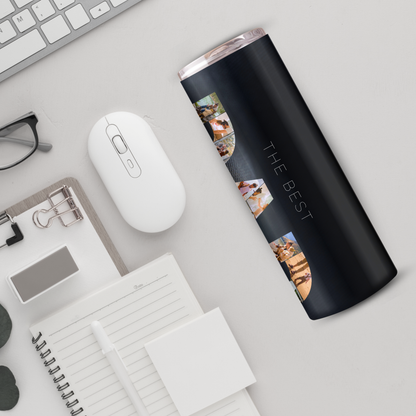 a variety of office supplies and accessories, including a computer mouse, a notebook, a pen, a pair of glasses, and a black tumbler with the text "THE BEST" printed on it.